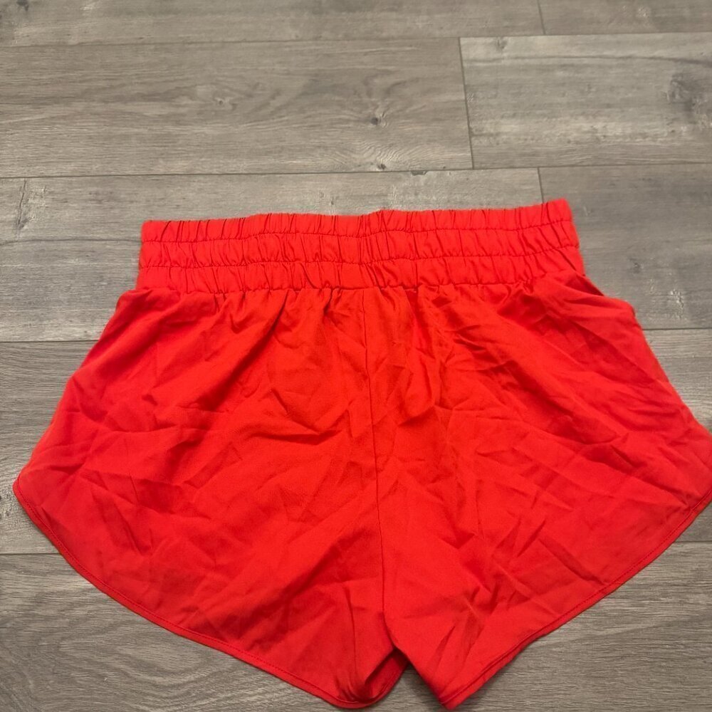 Red Athletic Running Shorts | Elastic Waist | Flowy Dolphin Hem - Picture 4 of 6